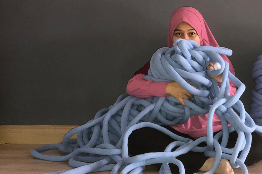 Woman with bulky yarn